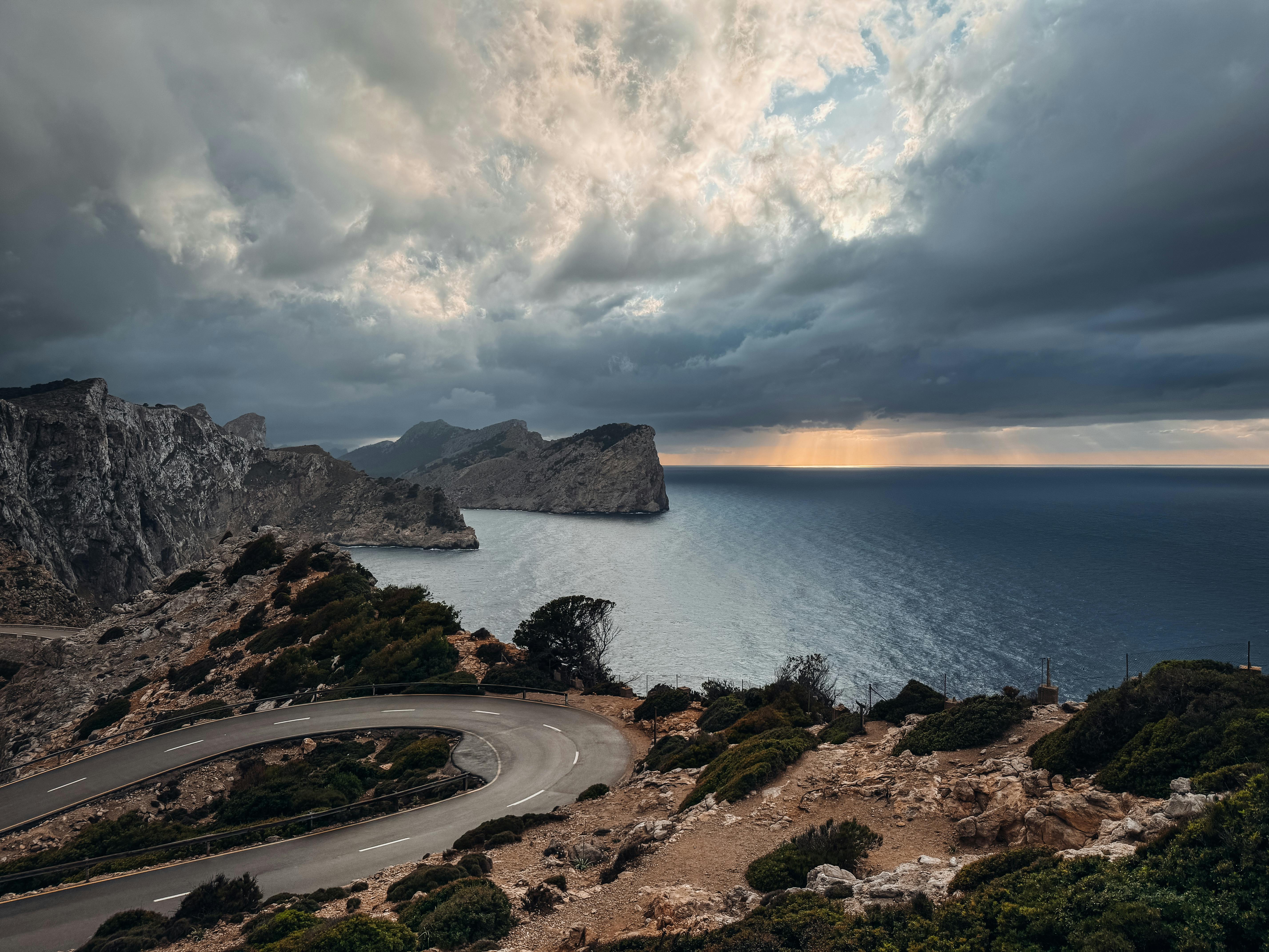 A car driving along the dramatic Mediterranean coast